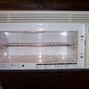 Picture Of Microwave Oven With A Metal Shelf